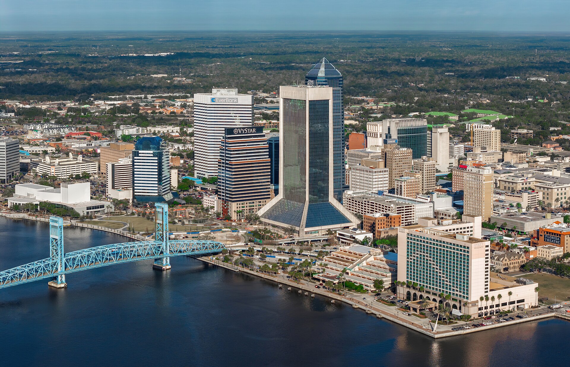 Downtown Jacksonville skyline and the Main Street Bridge over the St. Johns River, viewed from above the river.